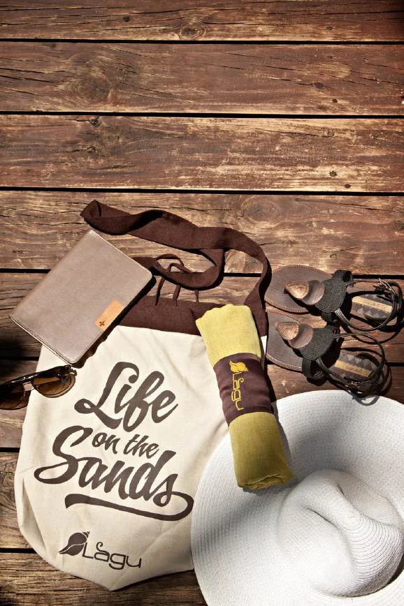 A Lagu beach bag and rolled blanket, ready for a day outdoors
